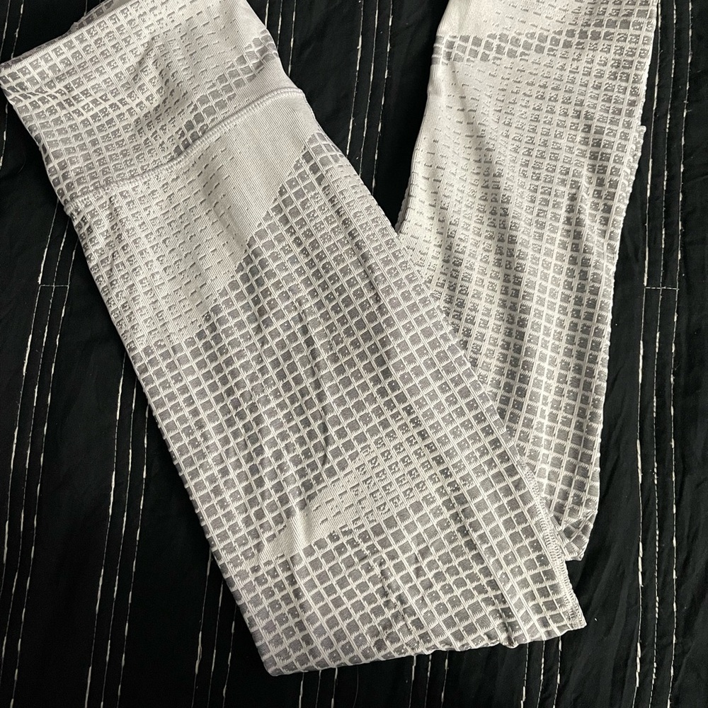Brand new. Cool design. Comfy. Stretchy. Great for workout!